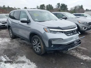 2021 Honda Pilot EX-L with VIN 5FNYF6H57MB010259, listed as a IAAI auction lot 41307012 with 57,849 mi miles. Bid and sale history available at carsss.com. Image 1.