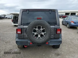 2019 Jeep Wrangler Unlimited Rubicon с VIN 1C4HJXFN0KW545613, выставлен на аукционе Copart как лот 42807785 с пробегом 64 510 миль миль и Списание • Salvage title. История ставок и продаж доступна на DreamBid. Изображение 6.