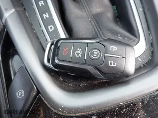 2014 Ford Fusion Titanium Hybrid with VIN 3FA6P0RU1ER291455, listed as a IAAI auction lot 41821152 with 108,408 mi miles. Bid and sale history available at carsss.com. Image 11.