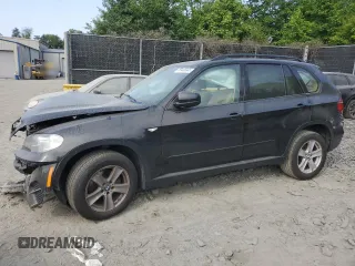 2012 BMW X5 35i with VIN 5UXZV4C5XCL761370, listed as a Copart auction lot 59436845 with 124,722 mi miles and Salvage title. Bid and sale history available at DreamBid. Image 1.