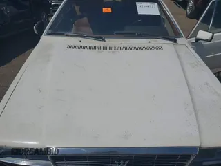 1985 Maserati Quattroporte z VIN ZAMBC1103FA305124, wystawiony jako IAAI lot #42164927 z przebiegiem 117 000 mil mil oraz . Historia ofert i sprzedaży dostępna na DreamBid. Obrazek 10.