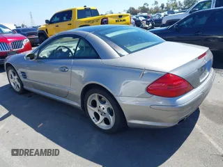 2004 Mercedes-Benz SL 500 with VIN WDBSK75F64F072167, listed as a IAAI auction lot 41862494 with 68,025 mi miles and . Bid and sale history available at DreamBid. Image 3.
