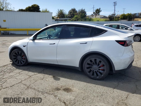 2022 Tesla Model Y Performance с VIN 7SAYGDEF2NF405596, выставлен на аукционе Copart как лот 52868195 с пробегом Не указан миль и Списание • Salvage title. История ставок и продаж доступна на DreamBid. Изображение 2.