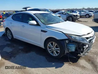 2013 Kia Optima LX with VIN 5XXGM4A72DG234036, listed as a IAAI auction lot 41689537 with 157,224 mi miles. Bid and sale history available at carsss.com. Image 1.