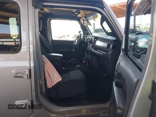 2019 Jeep Wrangler Unlimited Sport S z VIN 1C4HJXDG7KW557682, wystawiony jako IAAI lot #42586742 z przebiegiem 49 741 mil mil oraz . Historia ofert i sprzedaży dostępna na DreamBid. Obrazek 5.