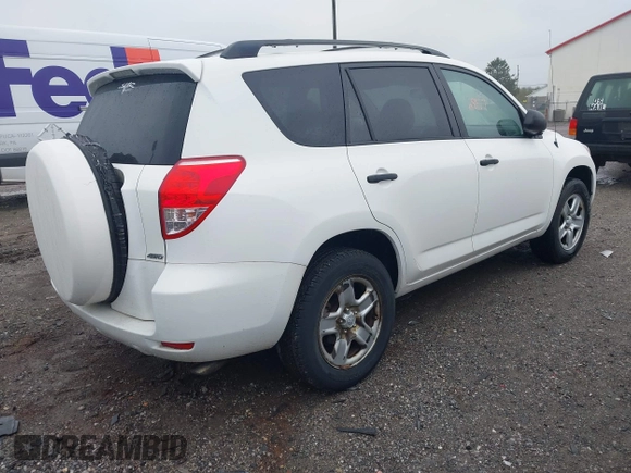 2006 Toyota RAV4 with VIN JTMBD33VX65015543, listed as a IAAI auction lot 41986857 with 124,709 mi miles. Bid and sale history available at carsss.com. Image 4.