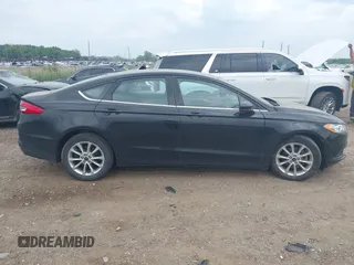 2017 Ford Fusion SE z VIN 3FA6P0H73HR283356, wystawiony jako IAAI lot #42416078 z przebiegiem 52 337 mil mil oraz . Historia ofert i sprzedaży dostępna na DreamBid. Obrazek 13.