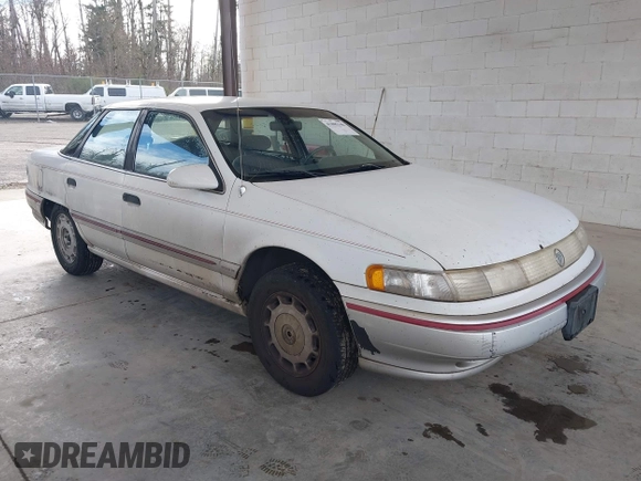 1992 Mercury Sable z VIN 1MECM5049NG647978, wystawiony jako IAAI lot #41805346 z przebiegiem 23 634 mil mil oraz . Historia ofert i sprzedaży dostępna na DreamBid. Obrazek 1.
