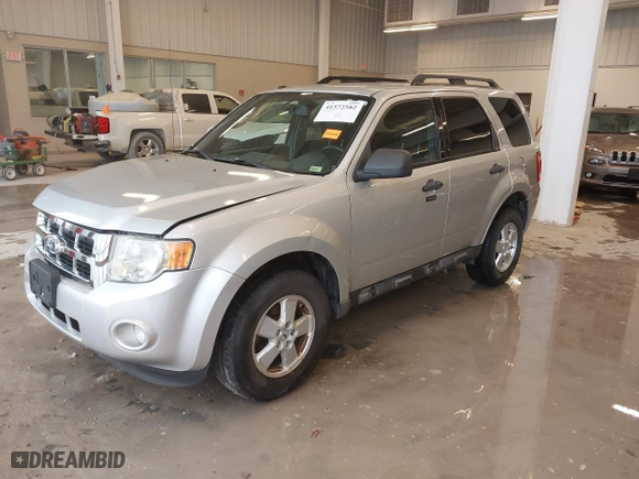 2010 Ford Escape XLT with VIN 1FMCU0D70AKB09942, listed as a IAAI auction lot 41572582 with 218,296 mi miles. Bid and sale history available at carsss.com. Image 2.