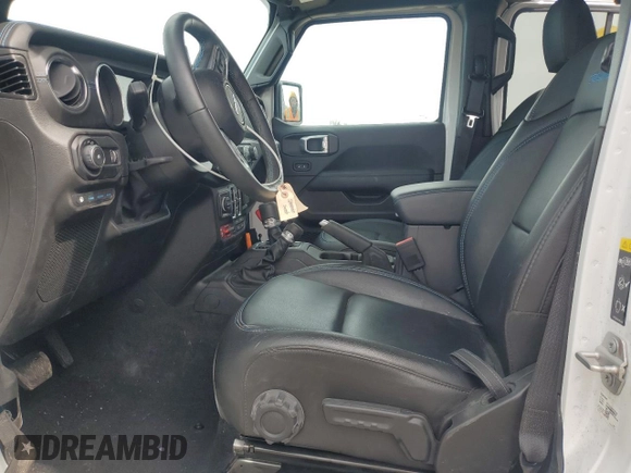 2023 Jeep Wrangler Rubicon z VIN 1C4JJXR6XPW663181, wystawiony jako Copart lot #49799125 z przebiegiem 8 085 mil mil oraz Szkoda całkowita • Salvage title. Historia ofert i sprzedaży dostępna na DreamBid. Obrazek 7.