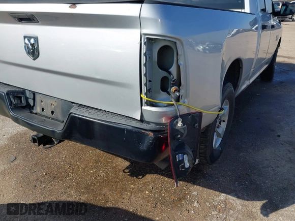 2014 Ram 1500 Tradesman with VIN 1C6RR6FG8ES314972, listed as a IAAI auction lot 41563554 with 233,285 mi miles and . Bid and sale history available at DreamBid. Image 6.