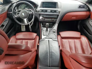 2014 BMW 6 Series 650i xDrive z VIN WBA6B4C53ED371461, wystawiony jako Copart lot #51136055 z przebiegiem 143 213 mil mil oraz Tytuł czysty. Historia ofert i sprzedaży dostępna na DreamBid. Obrazek 8.