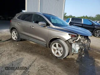 2017 Lincoln MKC Premiere z VIN 5LMCJ1C95HUL16078, wystawiony jako Copart lot #55853005 z przebiegiem 114 821 mil mil oraz Szkoda całkowita • Salvage title. Historia ofert i sprzedaży dostępna na DreamBid. Obrazek 4.