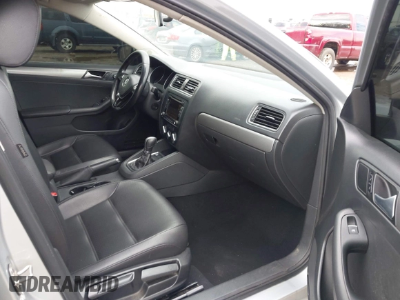 2015 Volkswagen Jetta Sedan 1.8T SE with VIN 3VWD17AJ4FM302117, listed as a IAAI auction lot 41917138 with 122,946 mi miles. Bid and sale history available at carsss.com. Image 5.
