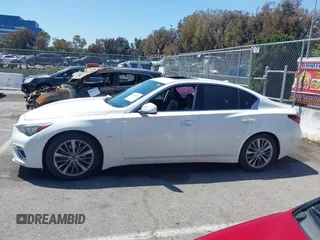 2019 Infiniti Q50 Luxe z VIN JN1EV7AP7KM518276, wystawiony jako IAAI lot #42148033 z przebiegiem 56 720 mil mil oraz . Historia ofert i sprzedaży dostępna na DreamBid. Obrazek 14.