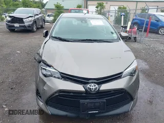 2018 Toyota Corolla L with VIN 2T1BURHE9JC990834, listed as a IAAI auction lot 42583027 with 217,143 mi miles and . Bid and sale history available at DreamBid. Image 12.