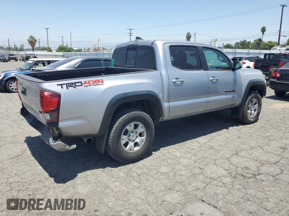 2019 Toyota Tacoma SR with VIN 3TMCZ5AN2KM277551, listed as a Copart auction lot 61586585 with 59,670 mi miles and Salvage title. Bid and sale history available at DreamBid. Image 3.