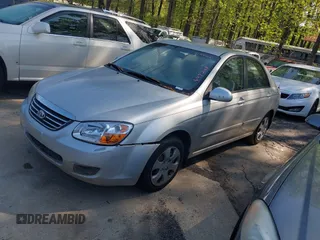 2009 Kia Spectra EX with VIN KNAFE221695647240, listed as a IAAI auction lot 41994191 with 237,101 mi miles. Bid and sale history available at carsss.com. Image 2.