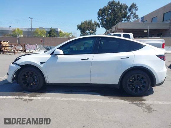 2021 Tesla Model Y Long Range with VIN 5YJYGDEEXMF280480, listed as a IAAI auction lot 41993633 with 69,579 mi miles. Bid and sale history available at carsss.com. Image 15.