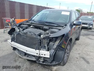 2016 Acura MDX w/Tech with VIN 5FRYD3H40GB011140, listed as a IAAI auction lot 41943684 with 126,131 mi miles. Bid and sale history available at carsss.com. Image 18.