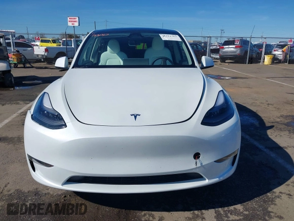 2023 Tesla Model Y Long Range with VIN 7SAYGDEE0PF945202, listed as a IAAI auction lot 41611762 with 7,316 mi miles and . Bid and sale history available at DreamBid. Image 12.