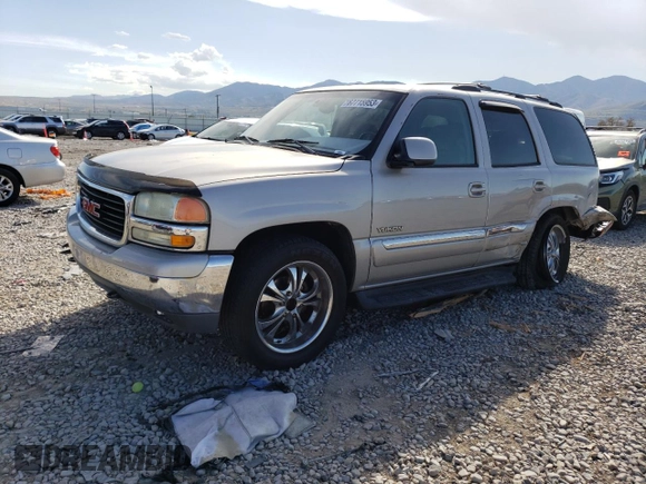 2004 GMC Yukon SLT with VIN 1GKEK13Z04J140148, listed as a Copart auction lot 52411494 with 167,629 mi miles and Salvage Title. Bid and sale history available at carsss.com. Image 1.