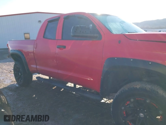 2016 Toyota Tundra 4WD Truck SR with VIN 5TFUM5F16GX064645, listed as a IAAI auction lot 41614790 with 144,400 mi miles. Bid and sale history available at carsss.com. Image 14.