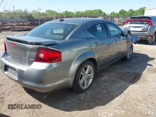 2013 Dodge Avenger SXT with VIN 1C3CDZCG7DN585431, listed as a IAAI auction lot 41975228 with 152,703 mi miles and . Bid and sale history available at carsss.com. Image 4.