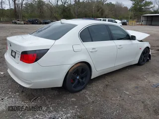 2007 BMW 5 Series 525i with VIN WBANE53547CW59197, listed as a IAAI auction lot 41867885 with 158,839 mi miles and . Bid and sale history available at carsss.com. Image 4.