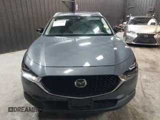 2022 Mazda CX-30 S Carbon Edition with VIN 3MVDMBCL8NM447234, listed as a IAAI auction lot 42511600 with 51,926 mi miles and . Bid and sale history available at DreamBid. Image 12.