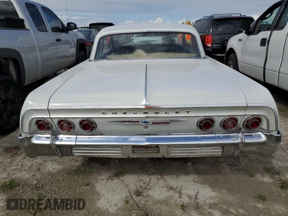 1964 Chevrolet Impala z VIN 41847J219664, wystawiony jako Copart lot #75891214 z przebiegiem 47 312 mil mil oraz Szkoda całkowita • Salvage title. Historia ofert i sprzedaży dostępna na DreamBid. Obrazek 6.