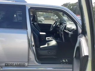 2014 Toyota 4Runner Limited with VIN JTEBU5JR9E5182133, listed as a IAAI auction lot 42081836 with 129,000 mi miles. Bid and sale history available at carsss.com. Image 5.