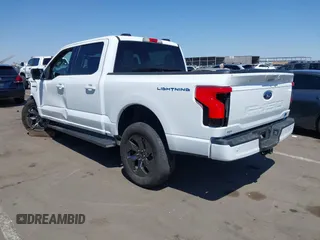 2023 Ford F-150 Lightning Pro with VIN 1FTVW1EL4PWG42578, listed as a IAAI auction lot 41992446 with 26,729 mi miles and . Bid and sale history available at DreamBid. Image 3.