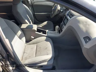2011 Chevrolet Malibu 1LS with VIN 1G1ZB5E17BF241076, listed as a IAAI auction lot 41996747 with 305,362 mi miles and . Bid and sale history available at DreamBid. Image 5.