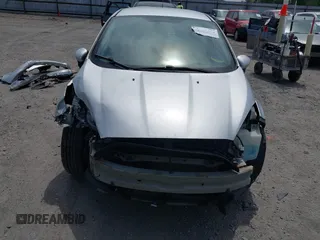 2019 Ford Fiesta SE z VIN 3FADP4EJ9KM107124, wystawiony jako IAAI lot #42067464 z przebiegiem 89 076 mil mil oraz . Historia ofert i sprzedaży dostępna na DreamBid. Obrazek 6.