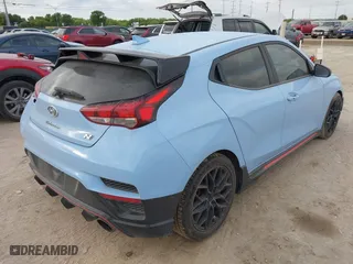 2020 Hyundai Veloster N with VIN KMHT36AH6LU004705, listed as a IAAI auction lot 42014151 with 155,813 mi miles. Bid and sale history available at carsss.com. Image 4.