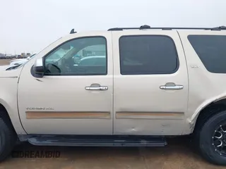 2011 GMC Yukon XL SLT with VIN 1GKS1KE01BR160725, listed as a IAAI auction lot 41587693 with 302,661 mi miles and . Bid and sale history available at carsss.com. Image 15.