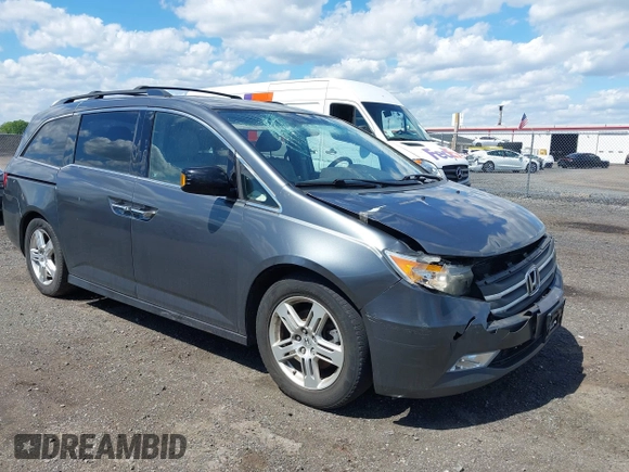 2011 Honda Odyssey Touring Elite with VIN 5FNRL5H96BB043339, listed as a IAAI auction lot 42174767 with 161,233 mi miles and . Bid and sale history available at DreamBid. Image 1.