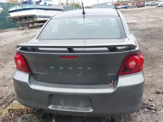 2013 Dodge Avenger SXT z VIN 1C3CDZCG0DN521540, wystawiony jako IAAI lot #40772548 z przebiegiem 145 455 mil mil oraz . Historia ofert i sprzedaży dostępna na DreamBid. Obrazek 16.