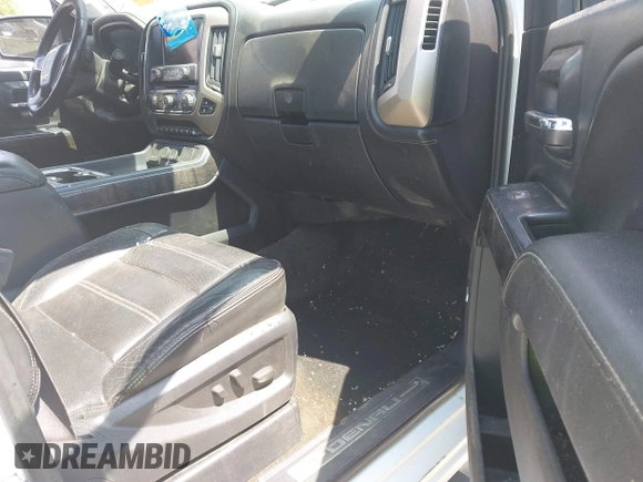 2015 GMC Sierra 2500HD Denali z VIN 1GT120E8XFF121170, wystawiony jako IAAI lot #42051421 z przebiegiem Nie podano mil oraz . Historia ofert i sprzedaży dostępna na DreamBid. Obrazek 5.