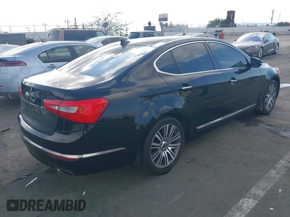 2014 Kia Cadenza Premium with VIN KNALN4D71E5130633, listed as a IAAI auction lot 41467874 with 105,278 mi miles. Bid and sale history available at carsss.com. Image 4.