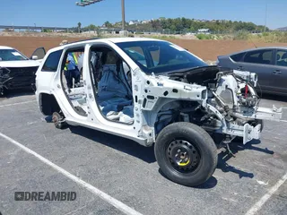 2021 Jeep Grand Cherokee Freedom with VIN 1C4RJFAG5MC615389, listed as a IAAI auction lot 42464413 with Not provided miles and . Bid and sale history available at DreamBid. Image 1.