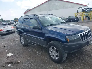 2003 Jeep Grand Cherokee Laredo with VIN 1J4GW48S13C553358, listed as a IAAI auction lot 42468733 with 332,783 mi miles and . Bid and sale history available at DreamBid. Image 1.
