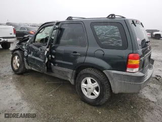 2003 Ford Escape XLS Popular with VIN 1FMYU021X3KA70123, listed as a Copart auction lot 86005514 with 0 mi miles and Salvage Title. Bid and sale history available at carsss.com. Image 2.
