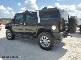 2003 Hummer H2 with VIN 5GRGN23U33H102570, listed as a Copart auction lot 77259654 with 0 mi miles and Salvage Title. Bid and sale history available at carsss.com. Image 2.
