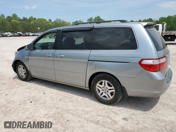 2007 Honda Odyssey EX-L with VIN 5FNRL38657B059033, listed as a Copart auction lot 54005495 with 212,674 mi miles and Salvage Title. Bid and sale history available at DreamBid. Image 2.