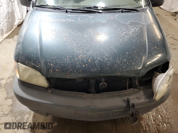 2001 Toyota Sienna LE with VIN 4T3ZF13C21U364516, listed as a Copart auction lot 79759924 with 100,185 mi miles and Salvage Title. Bid and sale history available at carsss.com. Image 12.