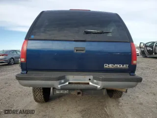 1999 Chevrolet Tahoe with VIN 3GNEK18R4XG124715, listed as a Copart auction lot 84744304 with 276,891 mi miles and Clean Title. Bid and sale history available at carsss.com. Image 6.