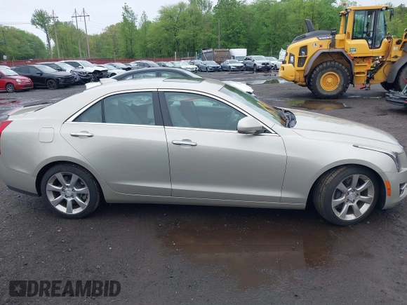 2015 Cadillac ATS Luxury RWD z VIN 1G6AB5RX8F0101942, wystawiony jako IAAI lot #42199906 z przebiegiem 58 627 mil mil oraz . Historia ofert i sprzedaży dostępna na DreamBid. Obrazek 13.