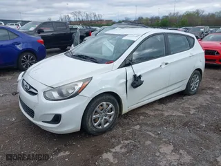 2013 Hyundai Accent GL with VIN KMHCT5AEXDU068215, listed as a IAAI auction lot 41922280 with 159,978 mi miles. Bid and sale history available at carsss.com. Image 2.